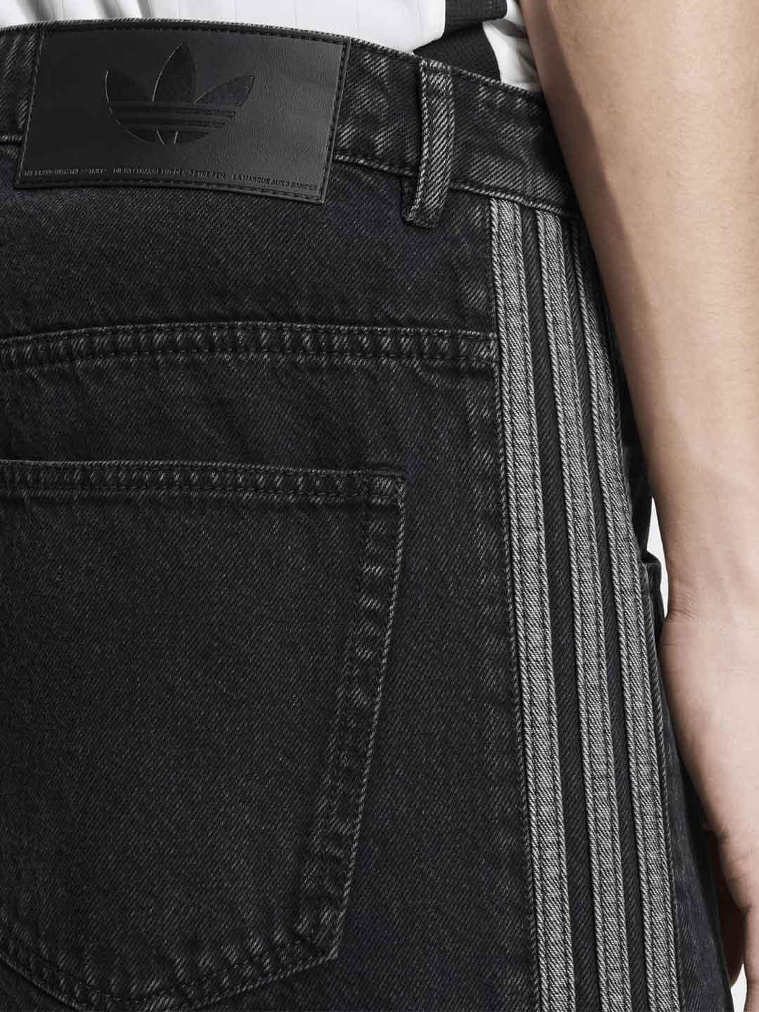 Adidas jeans nero con bande ai lati JC6718 NERO ADIDAS