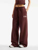 New Balance pantaloni bordeaux con logo bianco