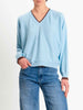 Tensione In t-shirt azzurra in filo