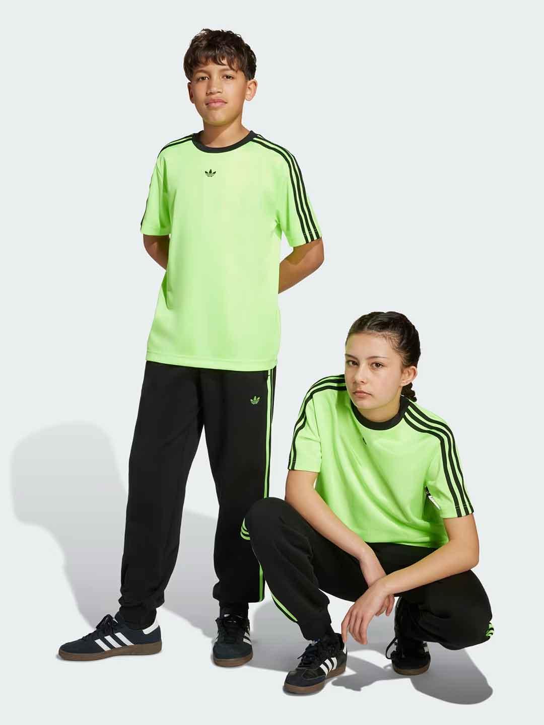 Adidas pantaloni kids nero con bande verdi JV7796 NERO ADIDAS 