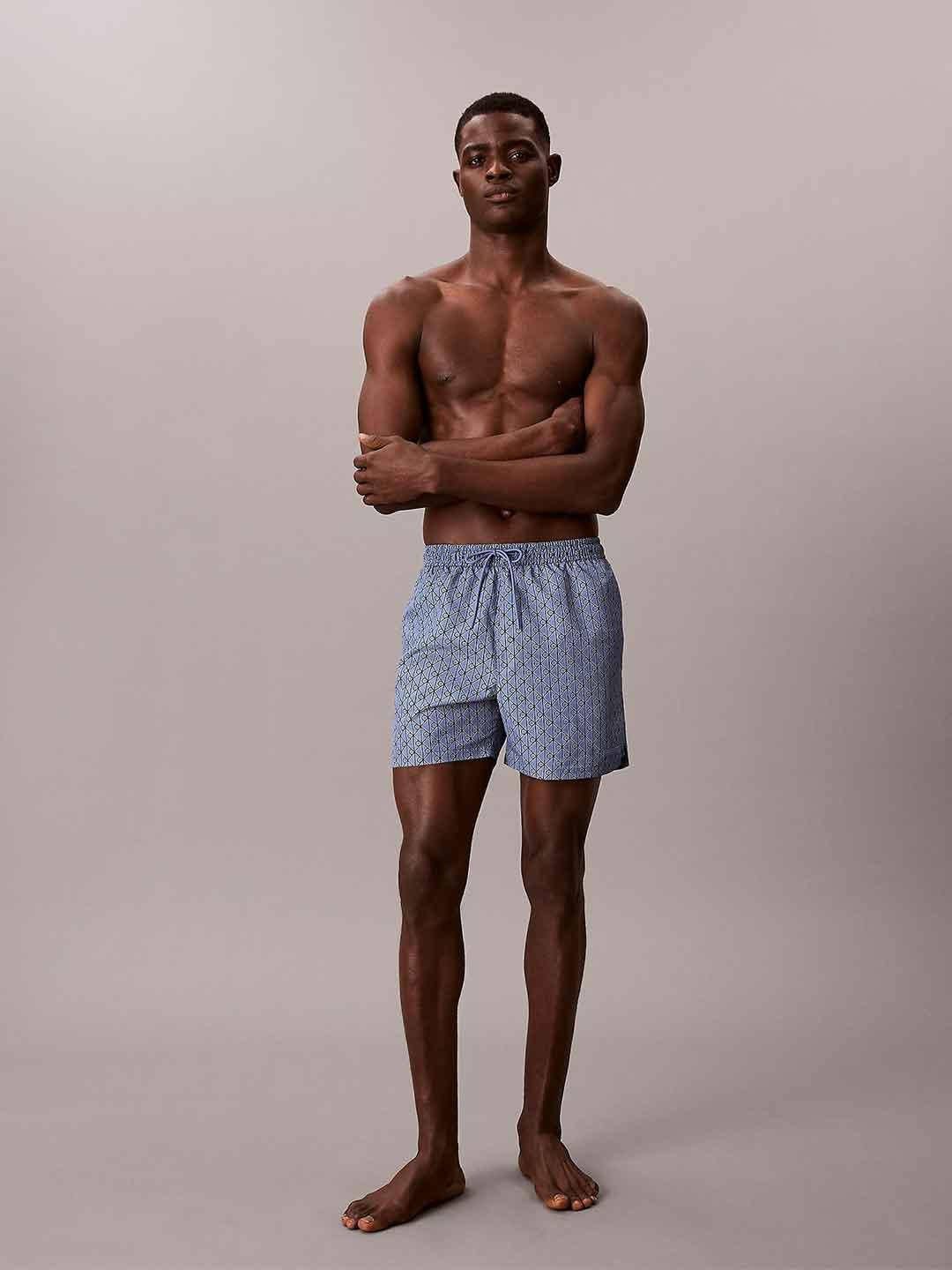 Calvin Klein costume celeste con multilogo LV00N61027 32W CELESTE CALVIN KLEIN 