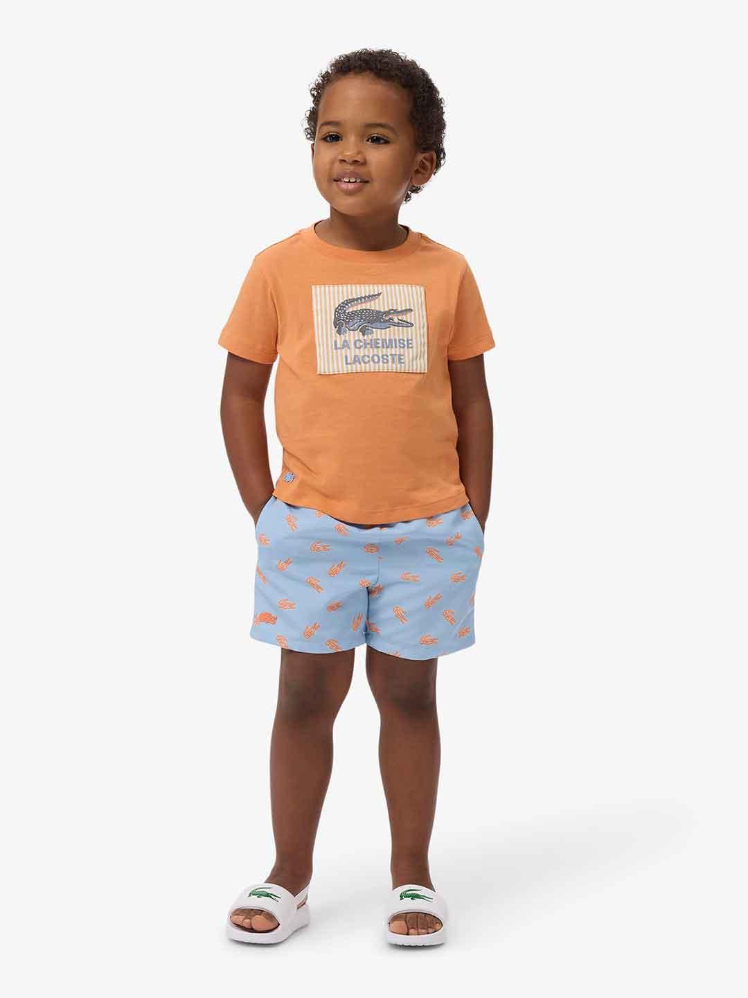Lacoste costume kids celeste con logo arancio 847660 UJD CELESTE LACOSTE 