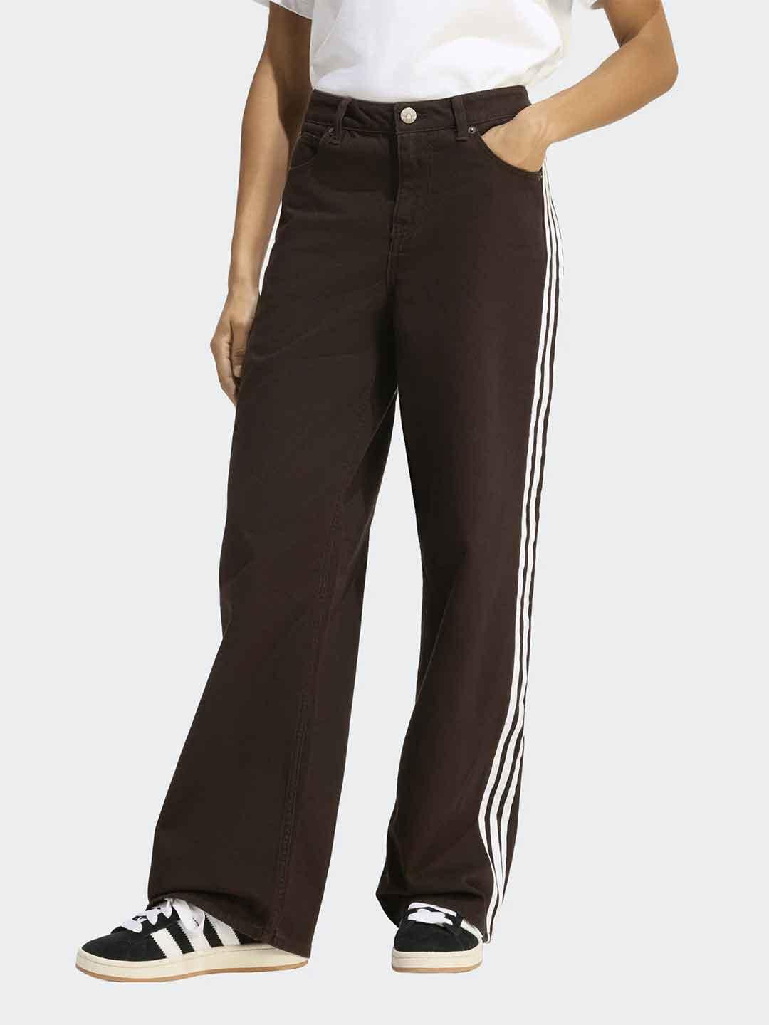 Adidas jeans marorne con bande bianche KD2934 MARRONE ADIDAS 
