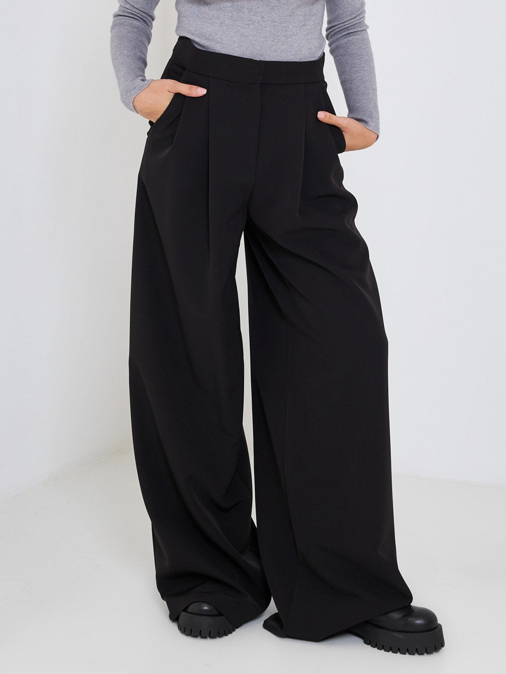Kostumn black palazzo trousers with logoed waist